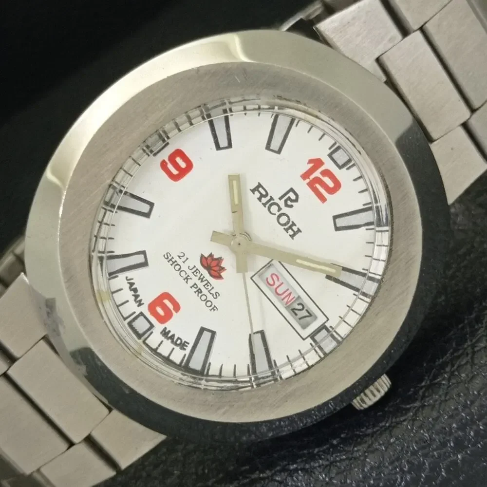 Vintage 1980 Ricoh Automatic Mens Silver Watch W/daydate & Red accents
